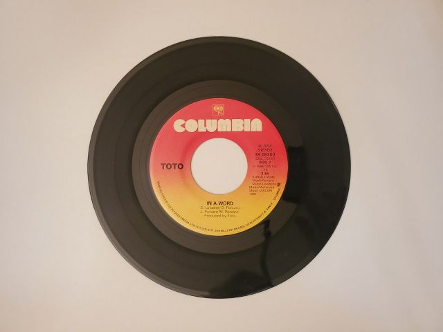 Toto In a Word / I'll Be Over You vinyl record