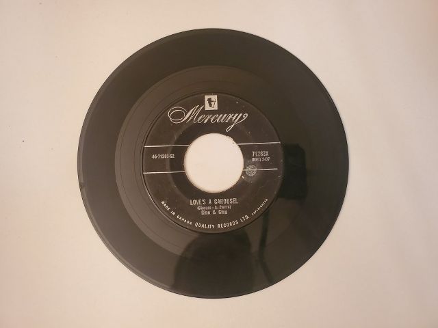 Gino & Gina Love's a Carousel / Pretty Baby vinyl record
