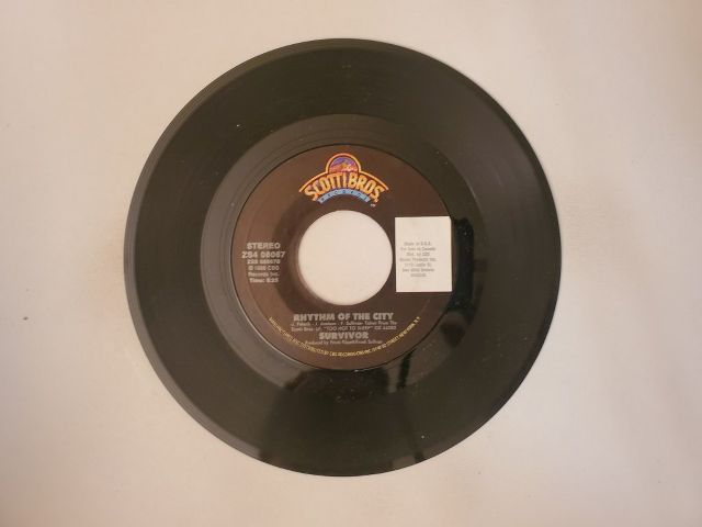 Survivor Rhythm of the City / Didn't Know It Was Love vinyl record