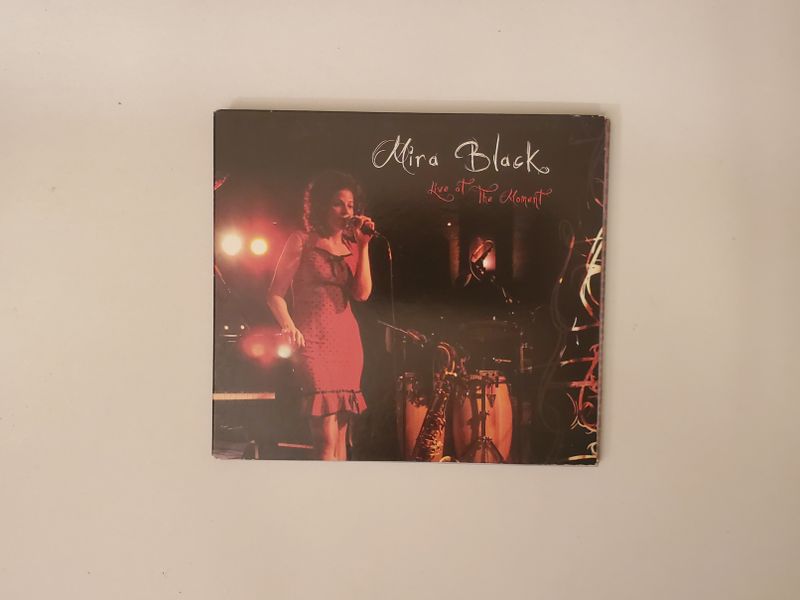 CD Mira Black - Live at The Moment video game