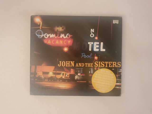 CD John and the Sisters - Domino Motel video game