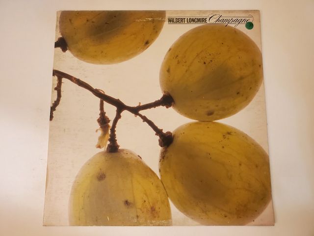 Wilbert Longmire Champagne vinyl record