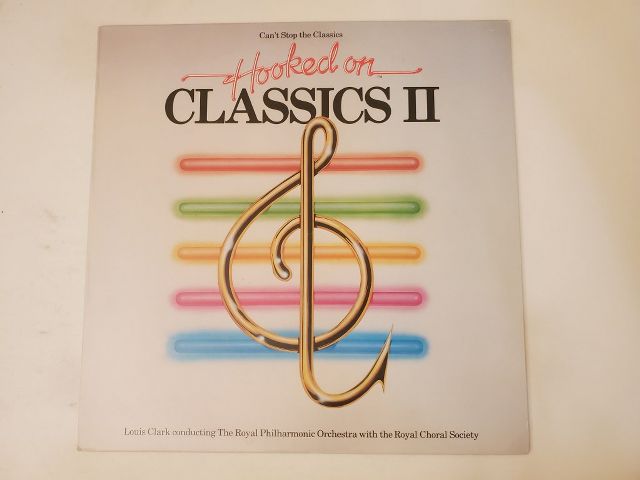 Louis Clark conducting The Royal Philharmonic Orchestra with the Royal Choral Society Hooked on Classics II vinyl record