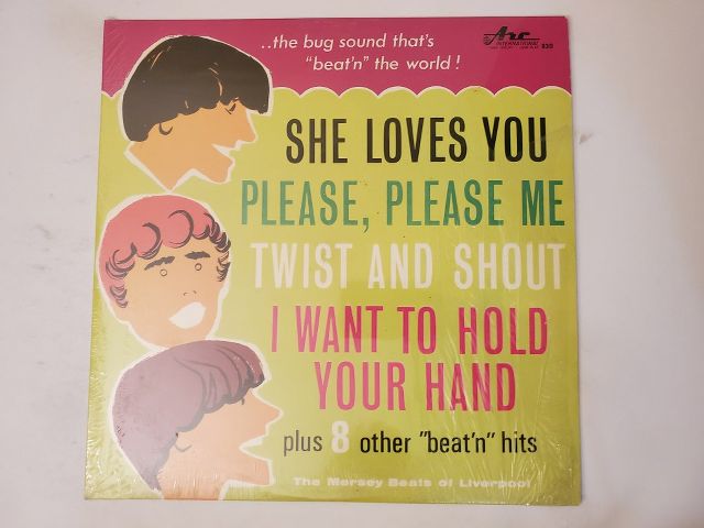 The Mersey Beats of Liverpool She Loves You / Please, Please Me / Twist and Shout / I Want to Hold Your Hand vinyl record